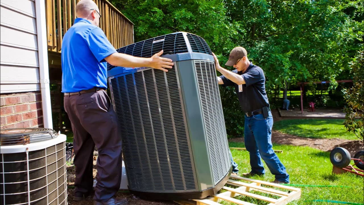 Air Factory technicians installing an air conditioning system in Oklahoma City