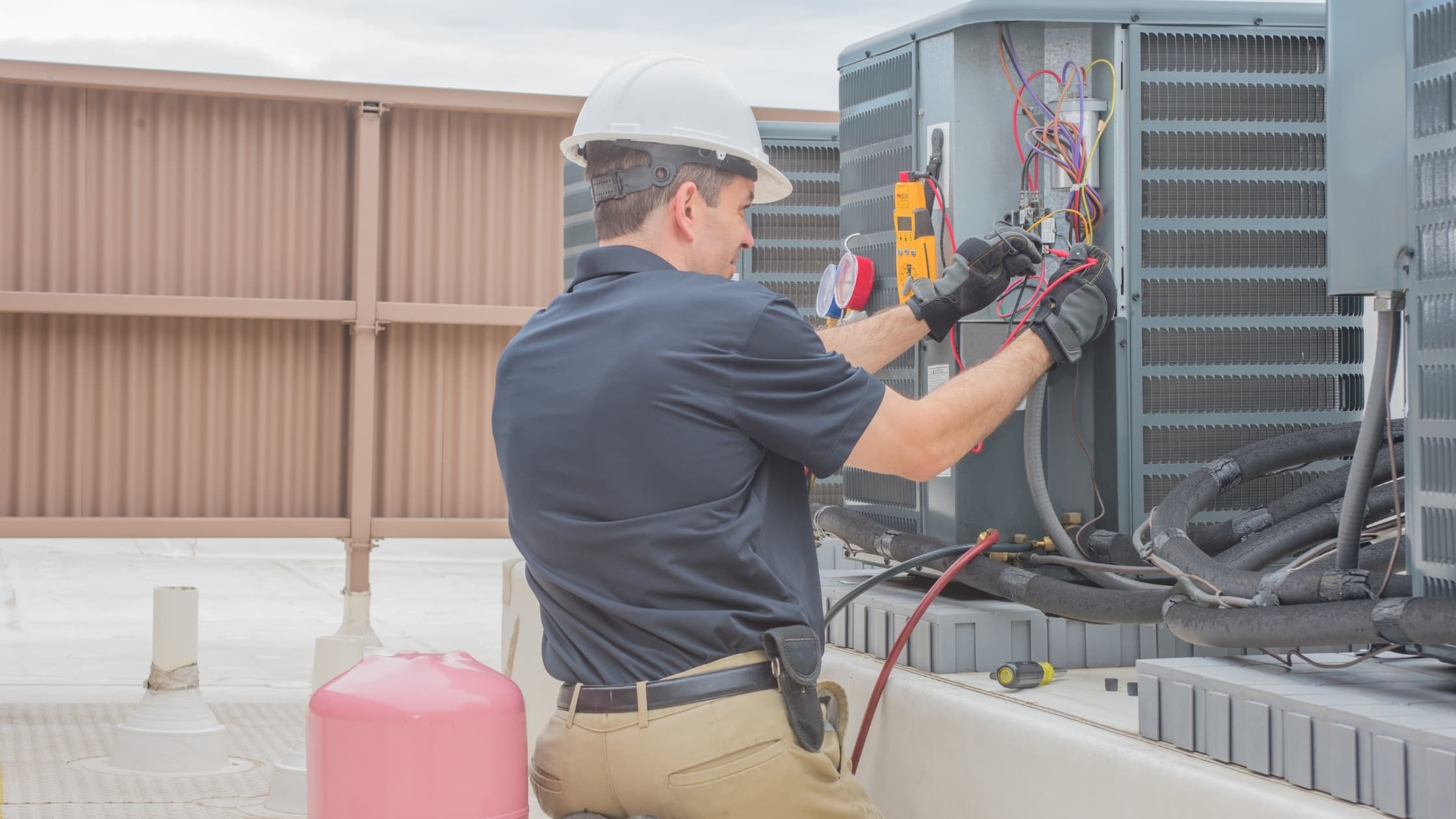 Air Factory technician diagnosing a cooling system in Oklahoma City